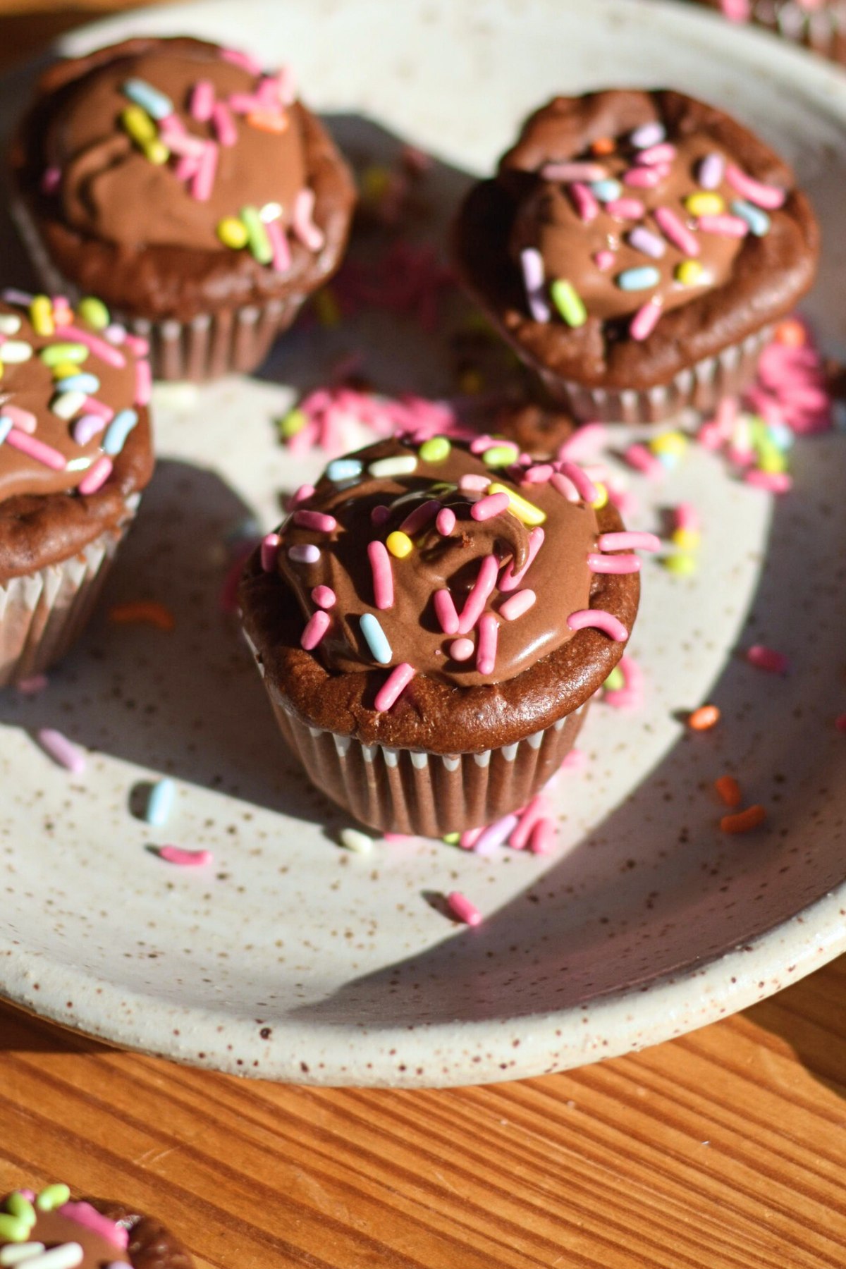 A plate of chocolate protein cupcakes.