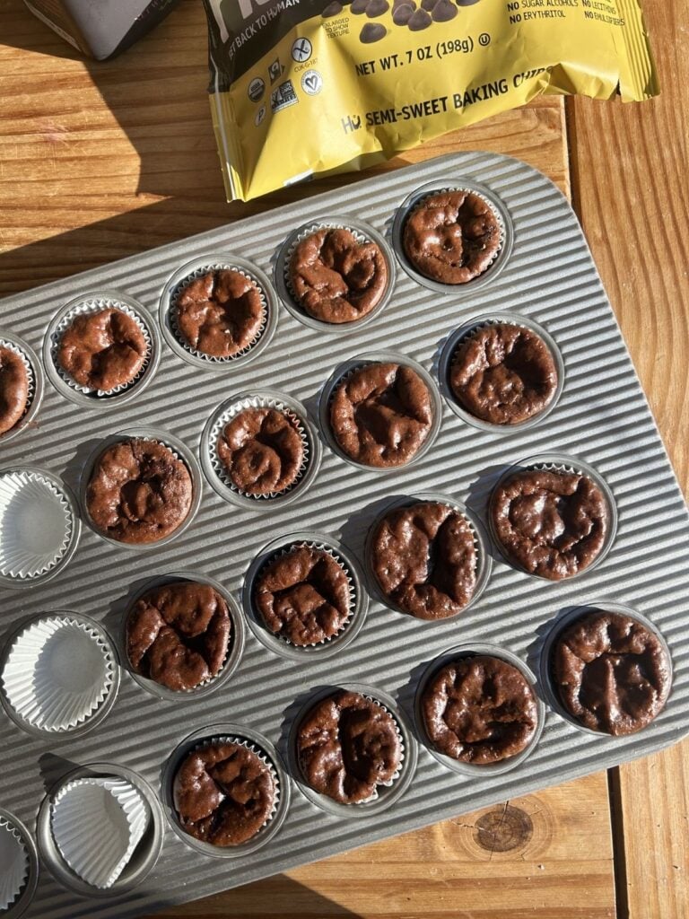 A tray of mini chocolate protein cupcakes.