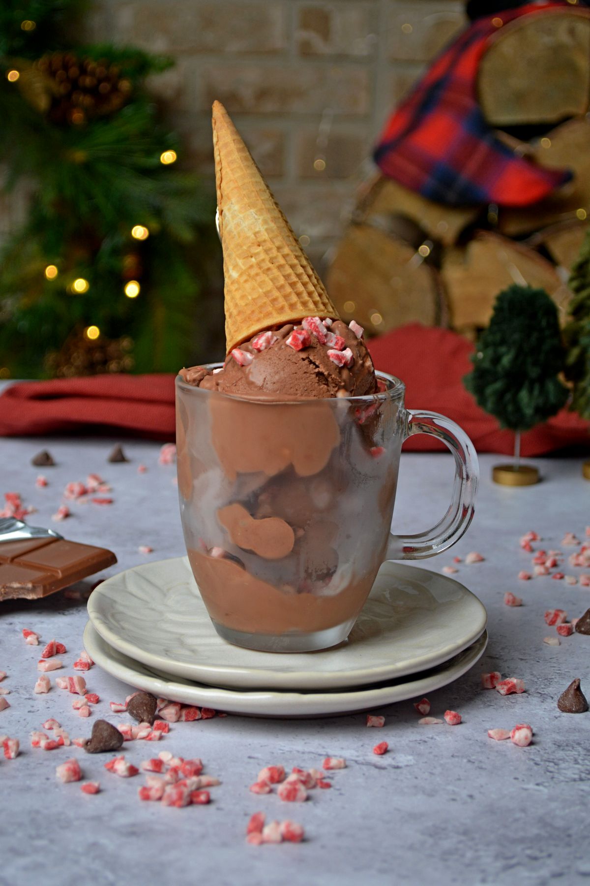 No Churn Christmas Ice Cream in a glass cup with a cone on top