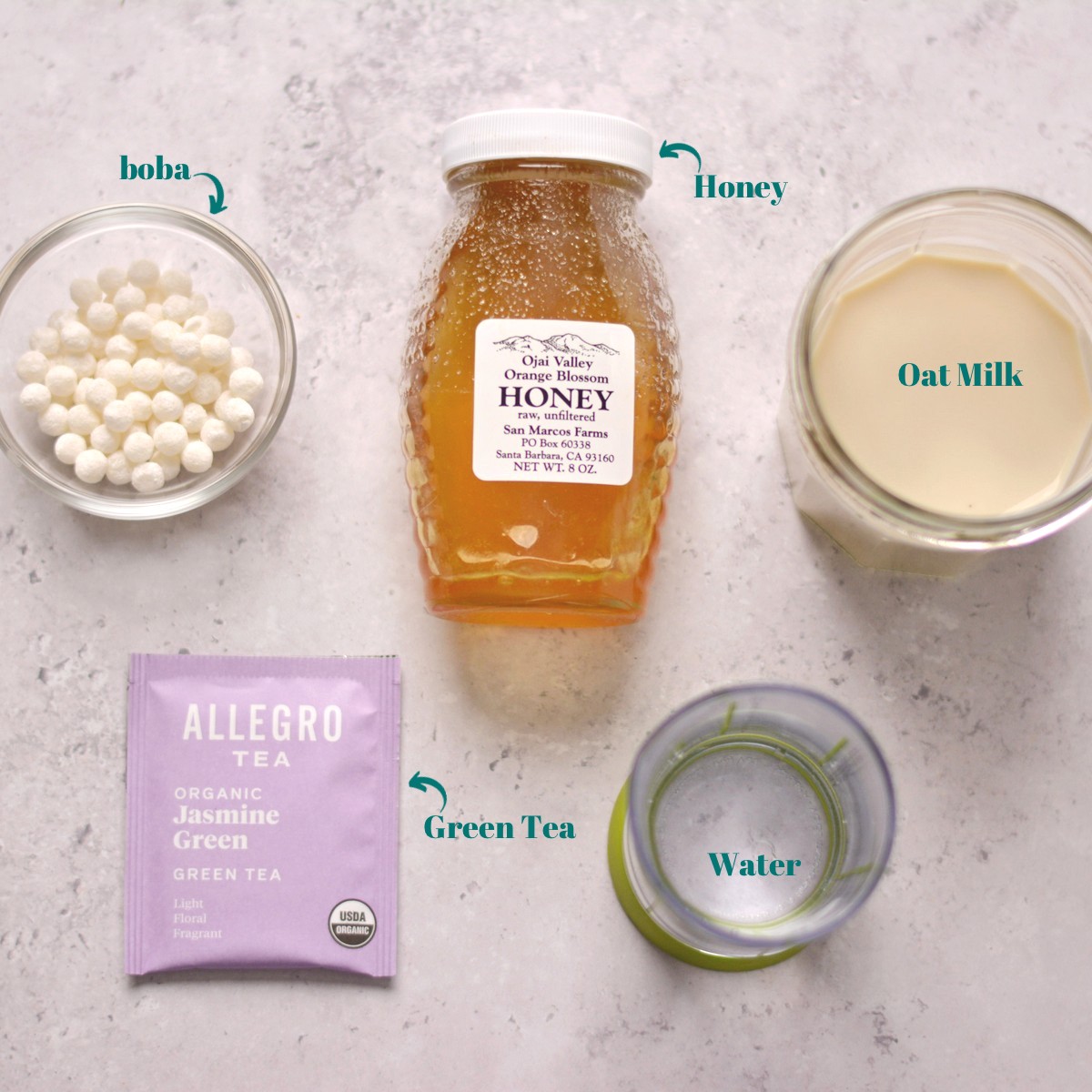 Overhead view of jasmine milk tea ingredients.