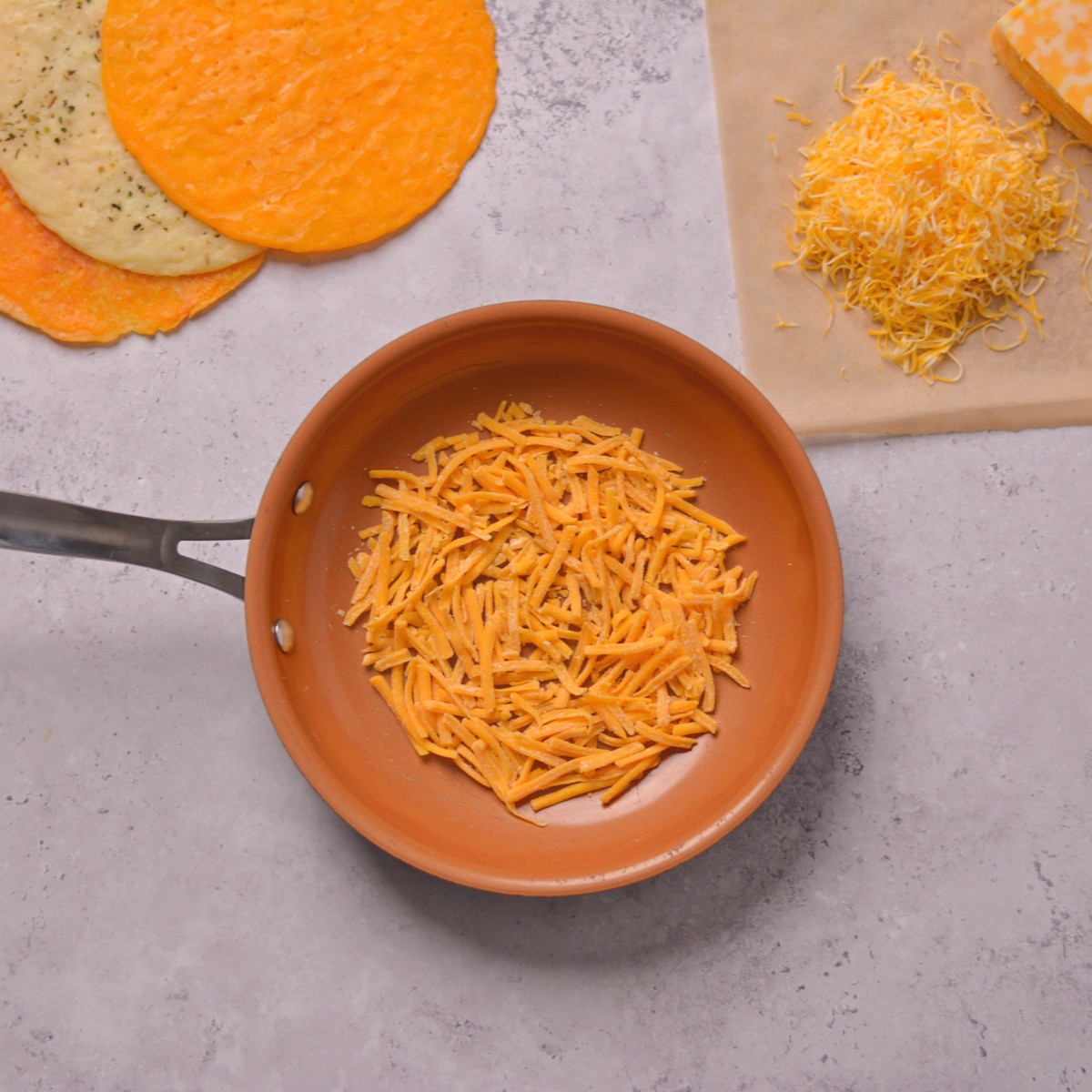 A pan with shredded cheese.