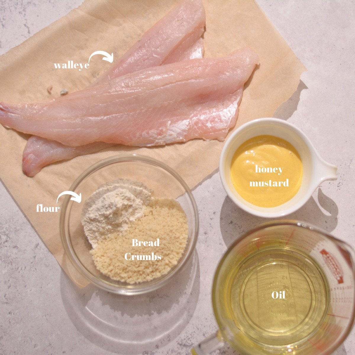 Ingredients for walleye including walleye, honey mustard, bread crumbs, flour, and oil.