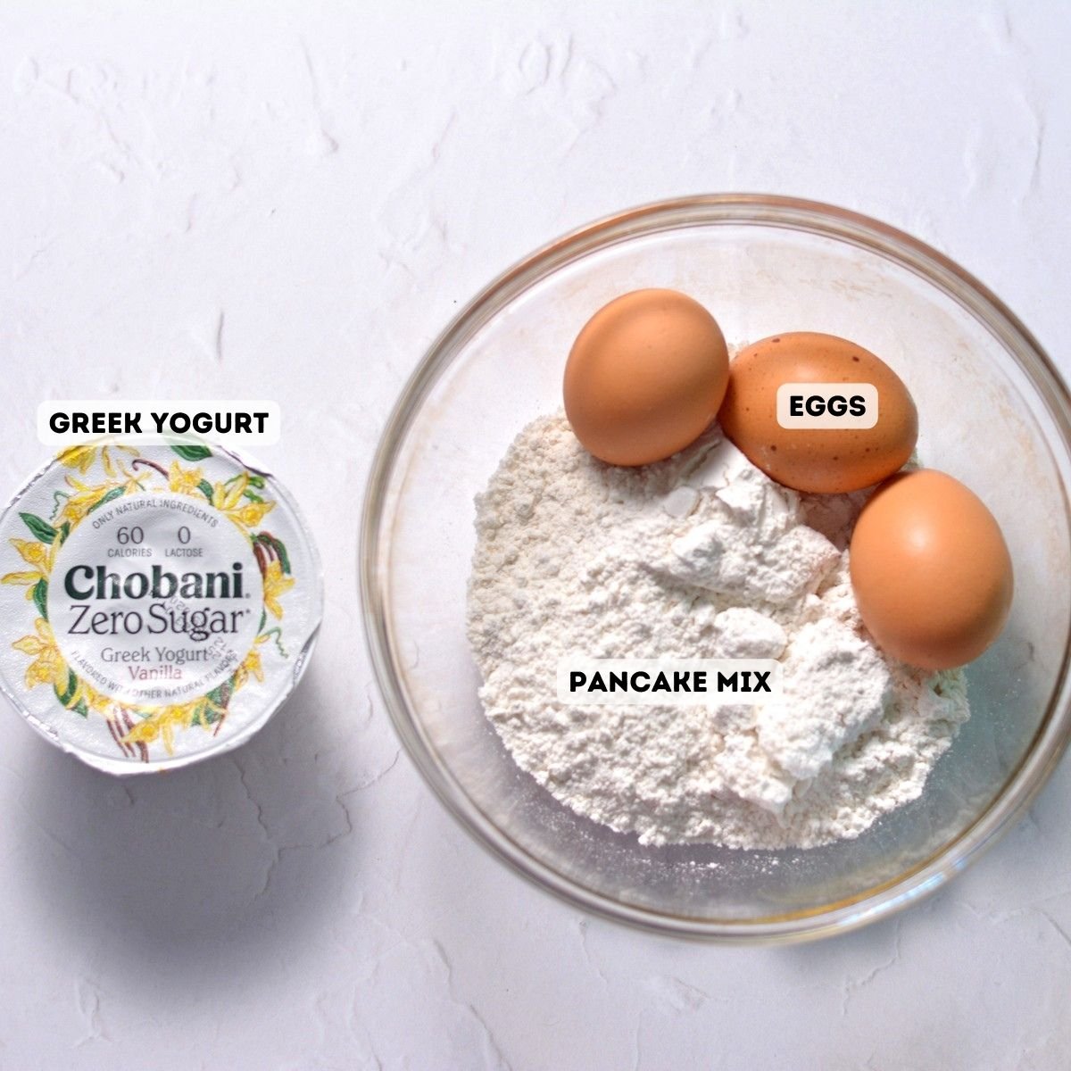 Ingredients including pancake mix, eggs, and vanilla greek yogurt.