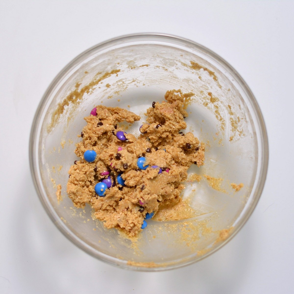A bowl with the cookie mixture in it.