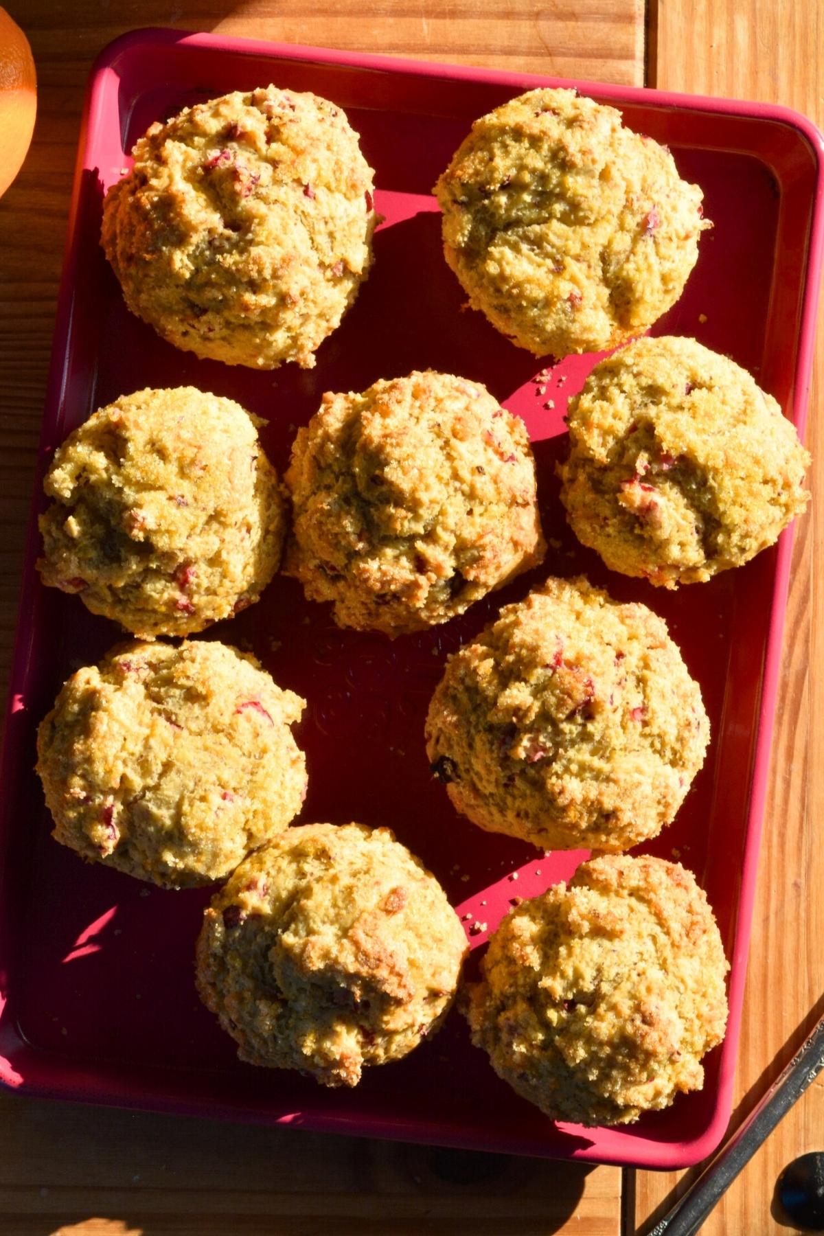 A tray of orange cranberry yogurt muffins.