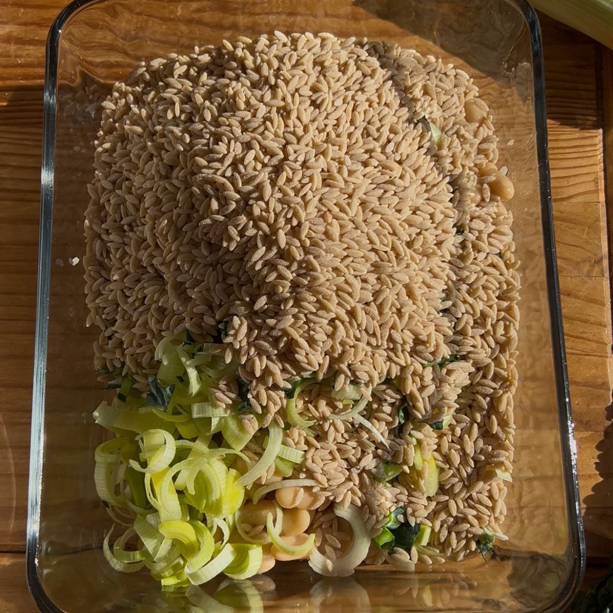 The ingredients in a white bean casserole before baking.