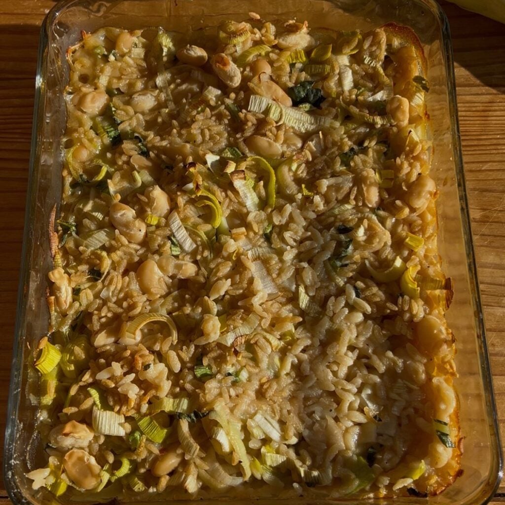 A white bean and leek casserole before adding cream.