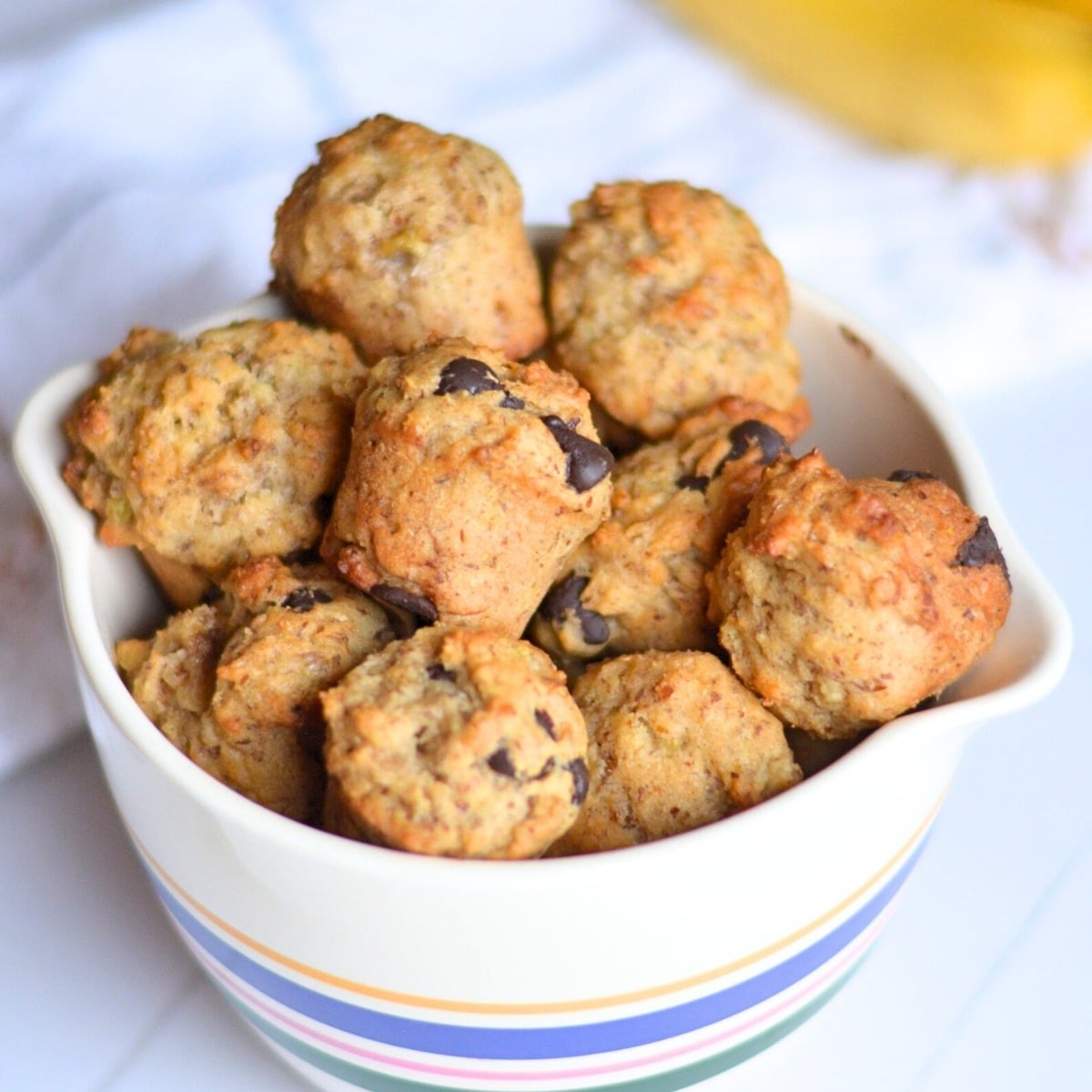 A bowl of banana bread bites.
