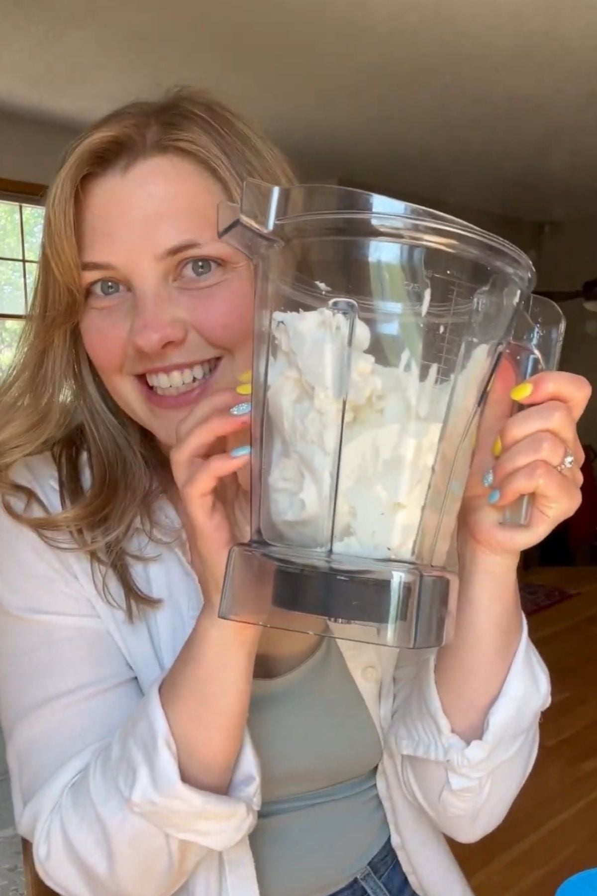 Mika with the dip in the blender before blending.