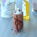 Dairy-free protein frappuccino with chocolate drizzle in glass