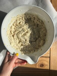 A bowl showing the cottage cheese batter after chilling.