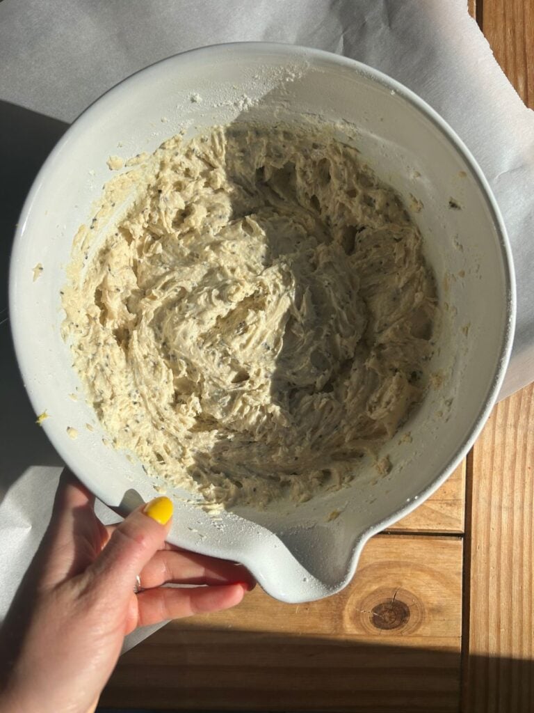 A bowl showing the cottage cheese batter after chilling.