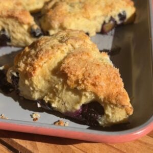 Baked cottage cheese scones on a tray.