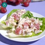 a plate with lettuce cups filled with california chicken salad.