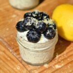 Chia seed pudding with Greek yogurt and blueberries and lemon sugar on top.