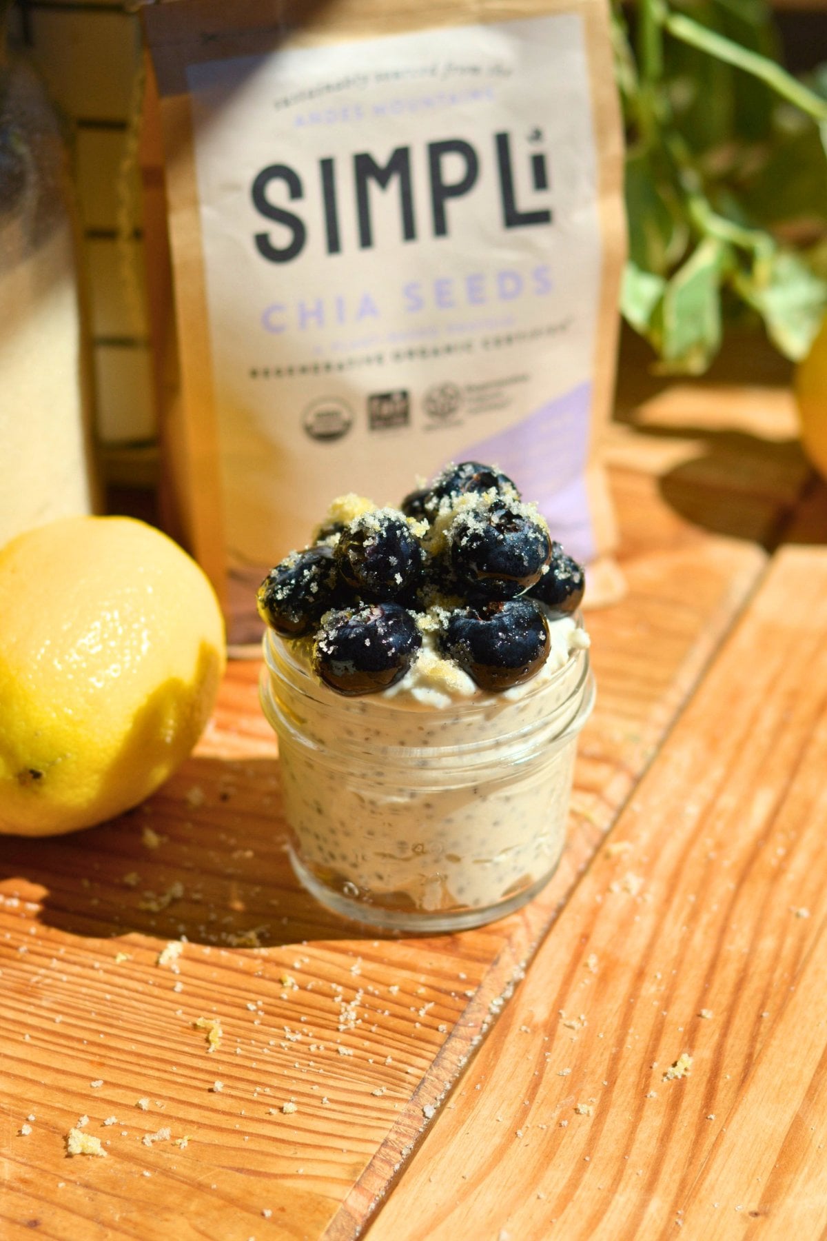 Chia seed pudding with Greek yogurt and blueberries and lemon sugar on top.