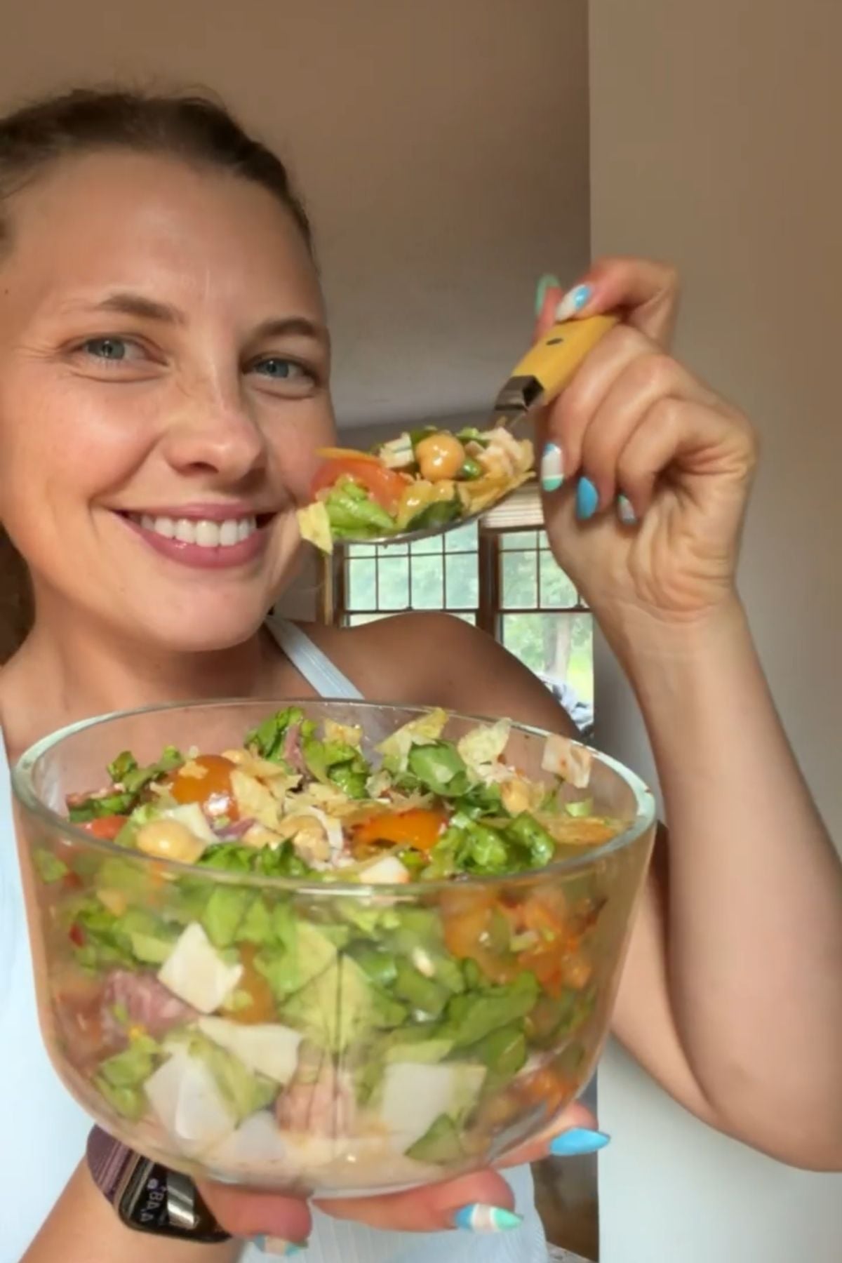 Mika holding the bowl of the sub in a tub.