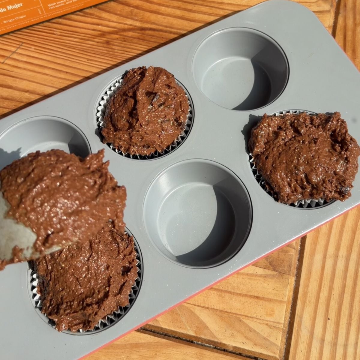 Muffin batter in the muffin tray every other one.