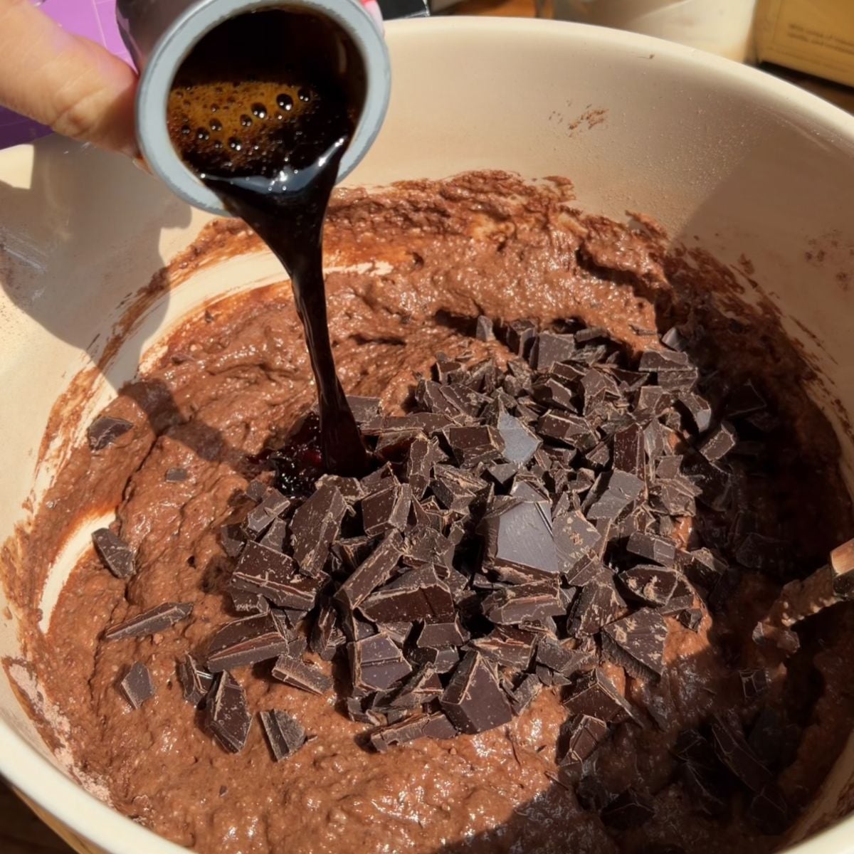 Adding coffee to the batter.